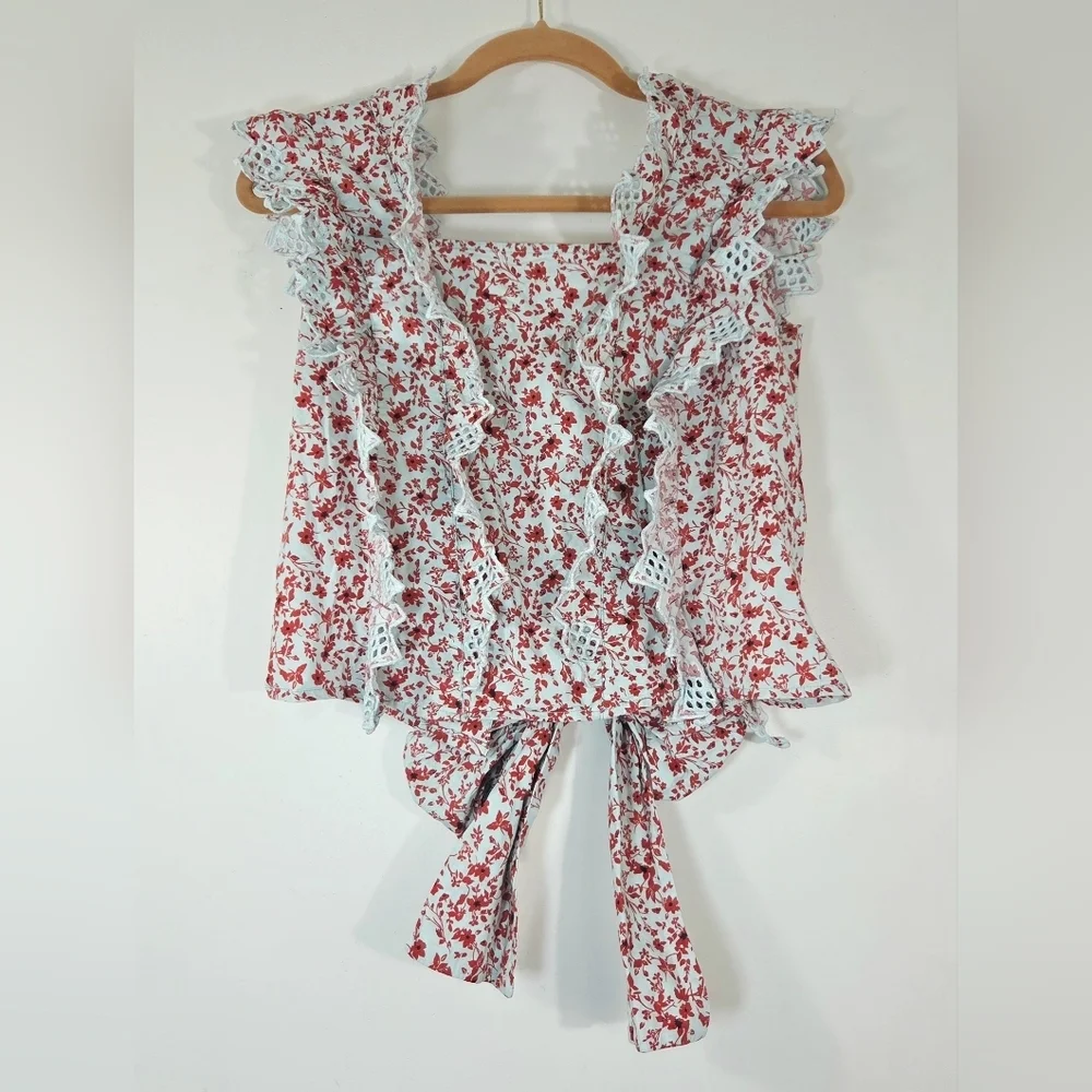 ANTHROPOLOGIE BLUE TASSEL TRINA BACK BOW FLORAL BLOUSE. - Picture 1 of 6
